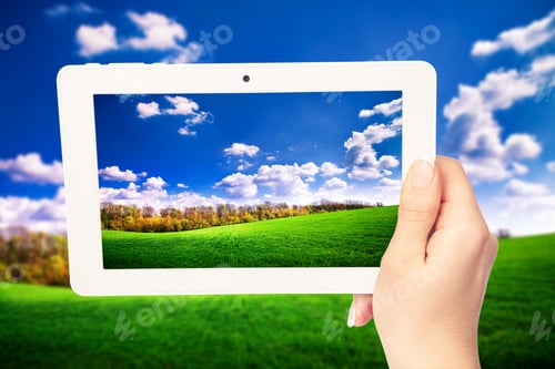Preview: Tablet Computer In Hand On The Field Backgrounds