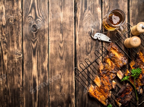 Preview: Ribs Grill With Beer . On A Wooden Table.
