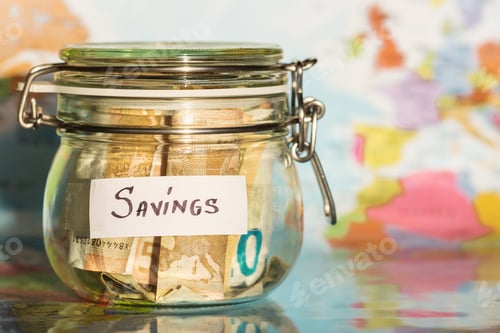 Preview: Savings Jar with Money on World Map