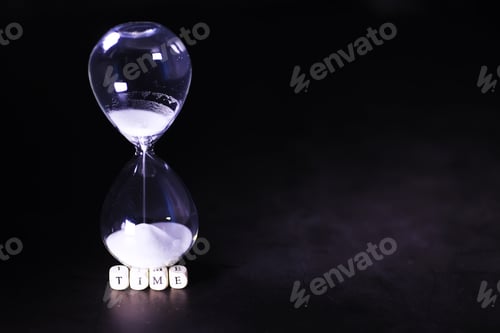 Preview: Sand Running Through The Bulbs Of An Hourglass Measuring The Passing Time In A Countdown To A
