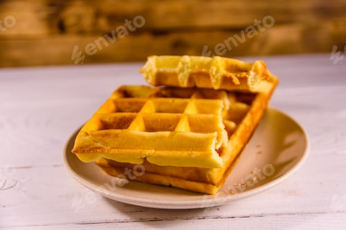 Preview: Ceramic Plate With Belgian Waffles On White Wooden Table