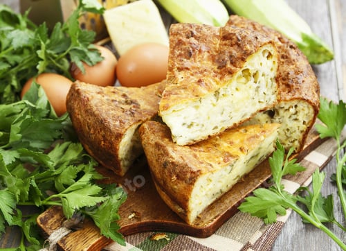 Preview: Pie With Zucchini, Cheese And Herbs On The Table