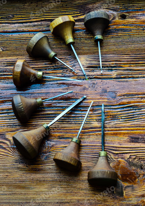 Preview: Different Gravers For Jewelry On A Wooden Background