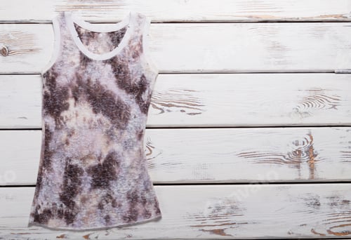 Preview: Spotted Summer Top On White Wooden Boards.