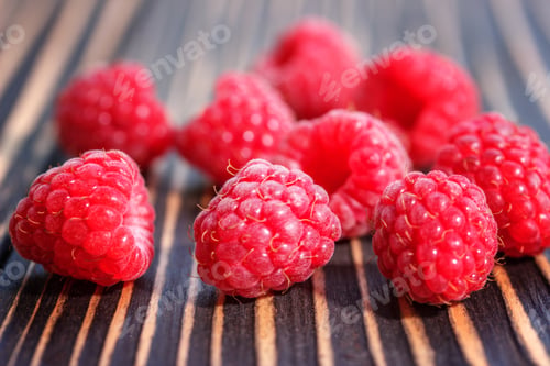 Preview: Fresh Raspberry On A Wooden Table Outdoors