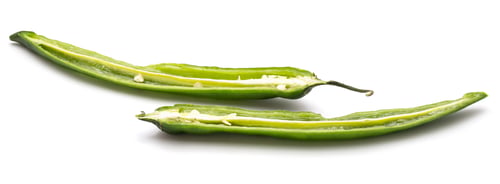 Preview: Two Halves Of Green Chilli Isolated On White Background