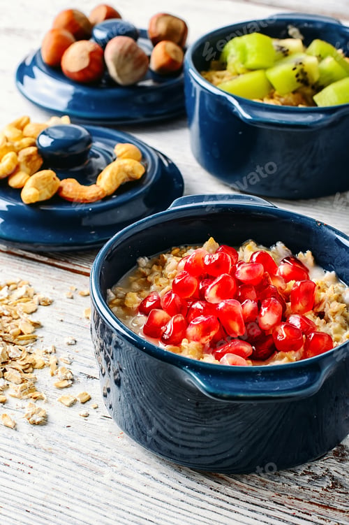 Preview: Blue Pot Of Porridge Decorated With Pomegranate Seeds