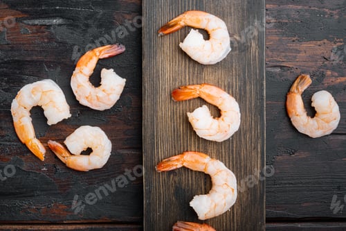 Preview: Peeled Shrimps Set, On Wooden Cutting Board, On Old Dark Wooden Table Background, Top View Flat Lay