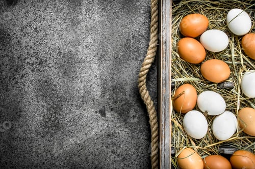 Preview: Fresh Chicken Eggs On An Old Tray. On A Rustic Background.