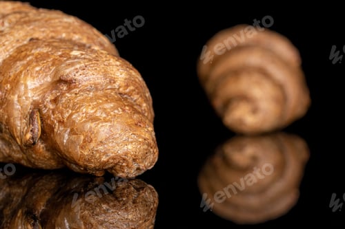 Preview: Group Of Two Whole Baked Wholegrain Croissant Closeup Isolated On Black Glass