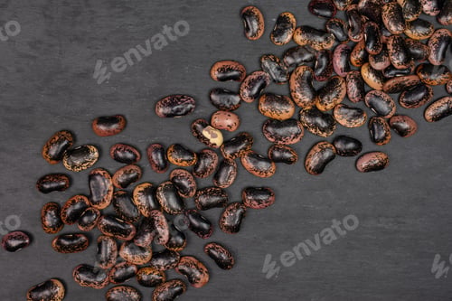 Preview: Lot Of Whole Stained Purple Bean Flatlay On Grey Stone