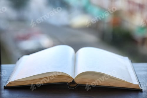 Preview: Open Book And A Table