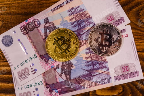 Preview: Bitcoin Coins On Russian Five Hundred Rubles Banknotes