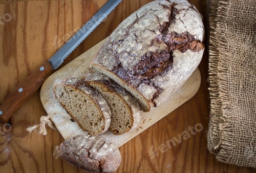 Preview: Freshly Baked Bread From Rye Flour On Wooden Table