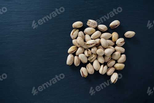Preview: Pistachio On Dark Background