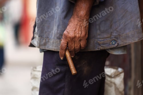 Preview: Man Holding A Cigar In The Street Of Havana, Cuba