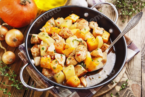 Preview: Chicken Stew With Pumpkin, Potatoes And Spices On The Table