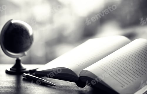 Preview: Open Book And A Table In Front Of The Window