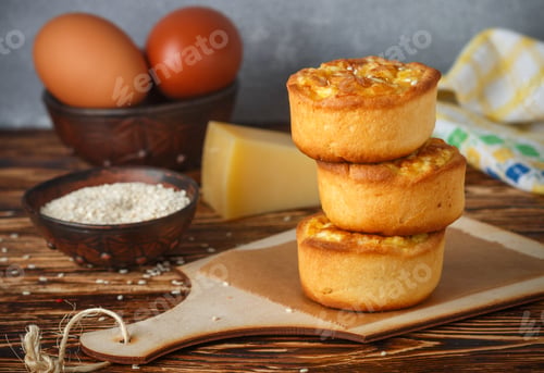 Preview: Mini Pies With Cheese, Onion And Egg. Tartlets. Delicious Snack For Gourmands. Selective Focus