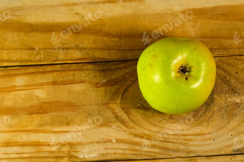 Preview: Green Apple On The Old Wooden Table