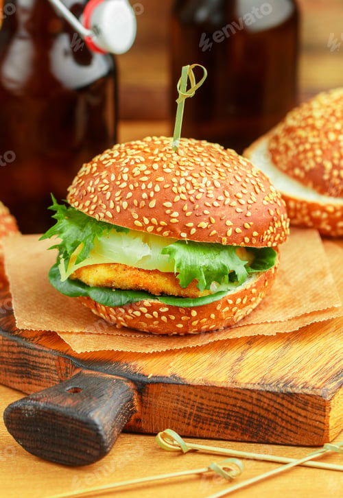Preview: Delicious Homemade Burger With Chicken, Herbs, Cheese, Tomatoes And Pineapples On A White Bun With