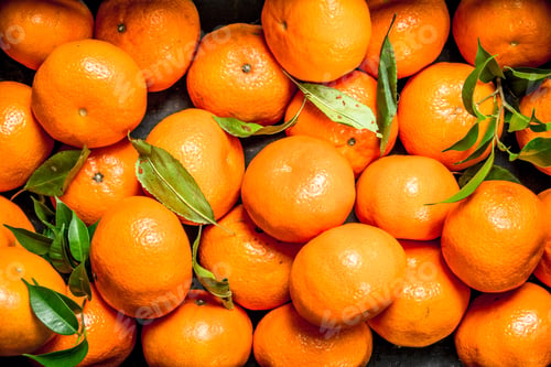 Preview: Fresh Ripe Tangerines With Leaves. Top View