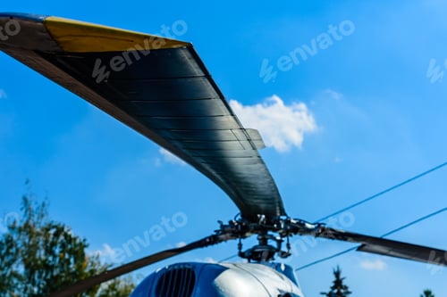 Preview: Closeup Of Helicopter Rotor Against Blue Sky