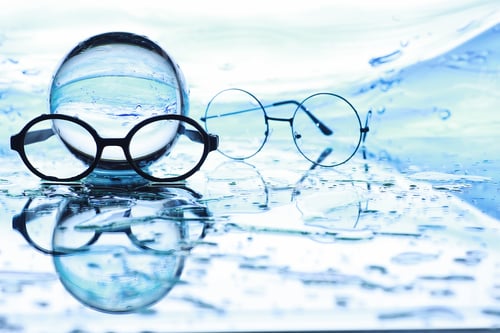 Preview: Tools For Vision Correction. Glasses And Lenses With Diopters On Background Of Splashes And Blurry.