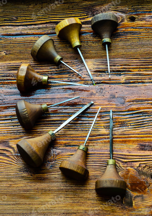 Preview: Different Gravers For Jewelry On A Wooden Background