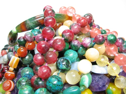 Preview: Group Of Colored Beads Isolated On White Background