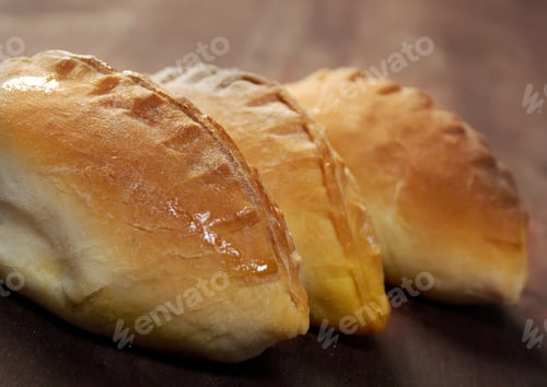 Preview: Pierogi .Home Cake With Jam Against The Wooden Table