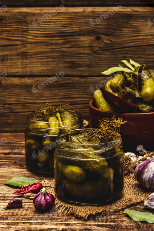 Preview: Marinated Pickled Cucumbers With Spices And Herbs. Traditional Fermented Appetizer In Glass Jars