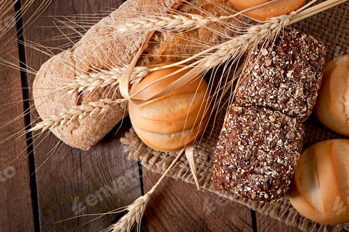 Preview: Assortment Of Baked Bread On A Wooden Table