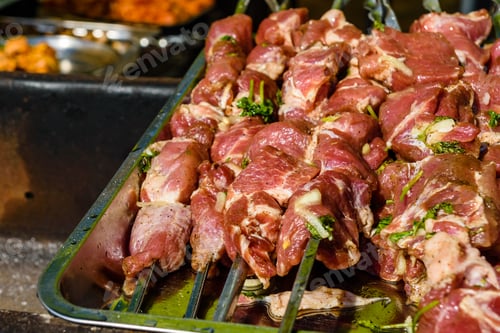 Preview: Skewers With Raw Meat Over Charcoals. Cooking Shashlik