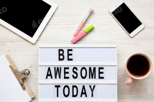 Preview: Feminine Workplace With Tablet, Noticepad, Sheet, Coffee And 'Be Awesome Today' Words On Light Box