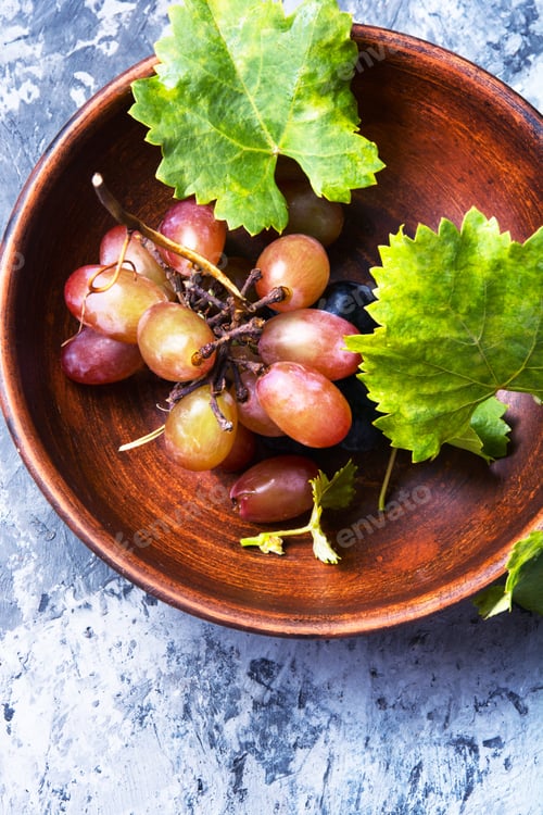 Preview: Brush Of Autumn Grapes With Foliage In A Plate