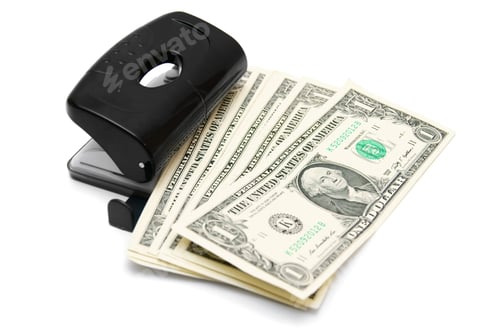 Preview: Money In Puncher. On A White Background.