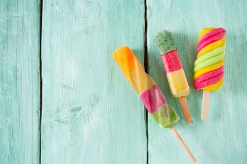 Preview: Colorful Popsicle Ice Cream On Turquoise Wooden Background
