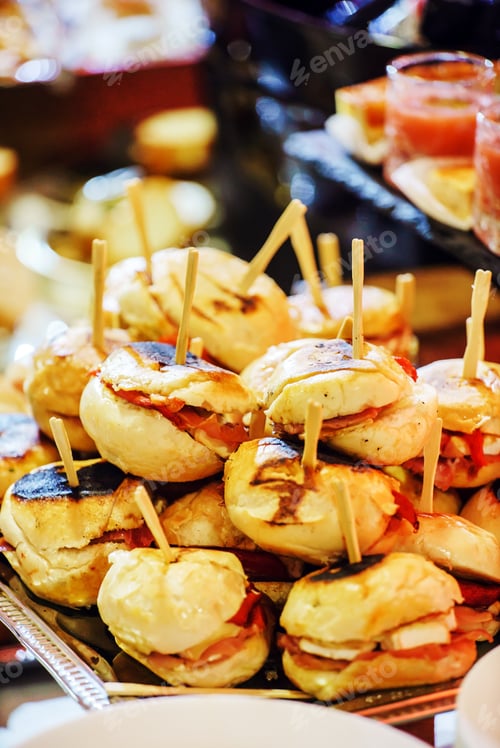 Preview: Delicious Mini Sandwiches Piled High on a Tray