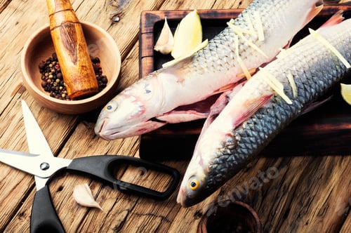Preview: Raw Sea Fish On Wooden Kitchen Board.Cooking Concept.Seafood