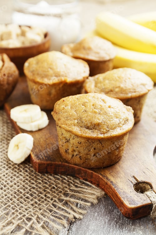 Preview: Homemade Banana Muffins On The Wooden Table