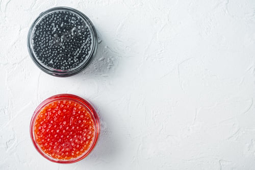 Preview: Glass Jar With Black And Red Caviar, On White Background, Top View Flat Lay With Copy Space For Text