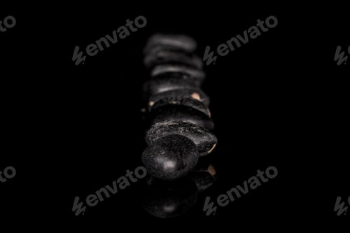 Preview: Lot Of Whole Black Bean In Row Isolated On Black Glass