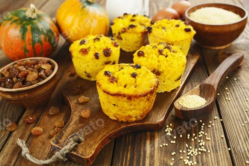Preview: Cake With Millet And Raisin On The Wooden Table