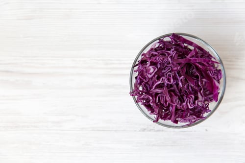 Preview: Chopped Red Cabbage In A Bowl, Close-Up. Top View, From Above, Overhead. Copy Space.