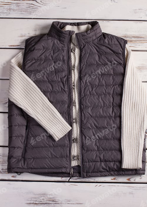 Preview: White Men'S Knitted Sweater And Vest On A White Wooden Background. Men'S Wear.
