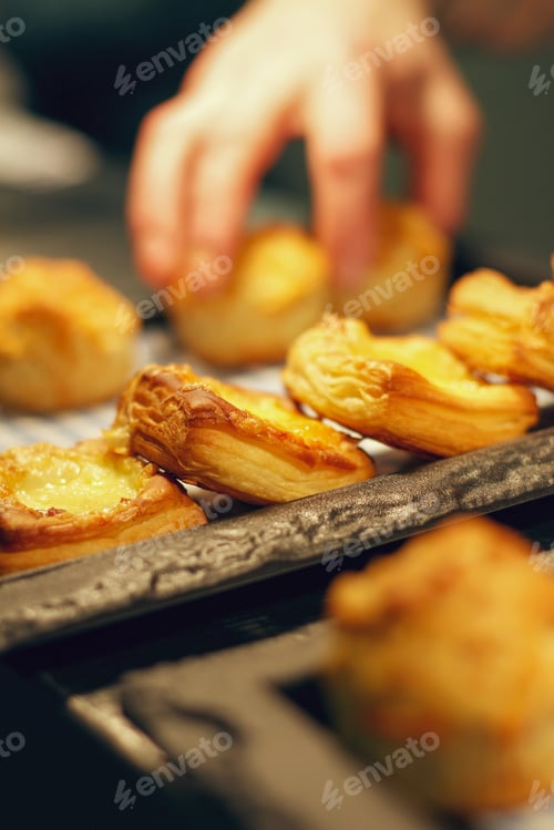 Preview: Chef Plating Fresh Baked Mixed Baked Pastries