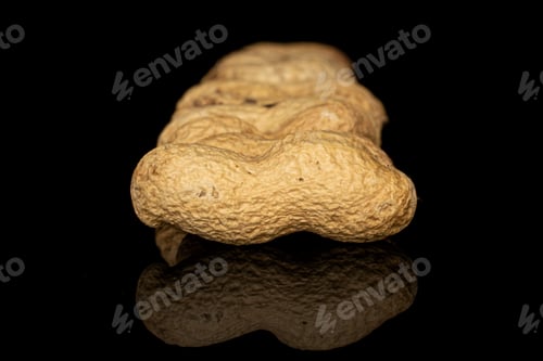 Preview: Lot Of Whole Tasty Beige Peanut In Row Isolated On Black Glass
