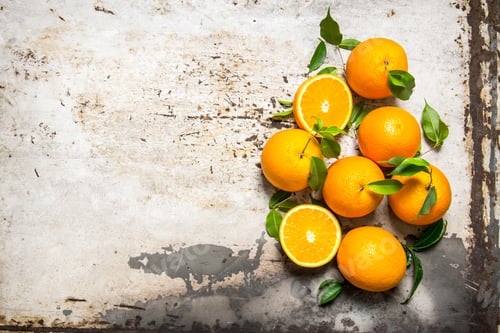 Preview: Fresh Oranges With Leaves. On The Rustic Background. Free Space For Text . Top View