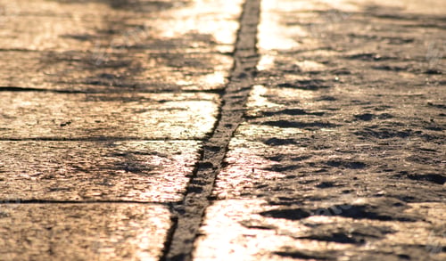 Preview: Cobblestone Sidewalk Made Of Granite Stones At Sunny Day, Can Be Used As A Background.